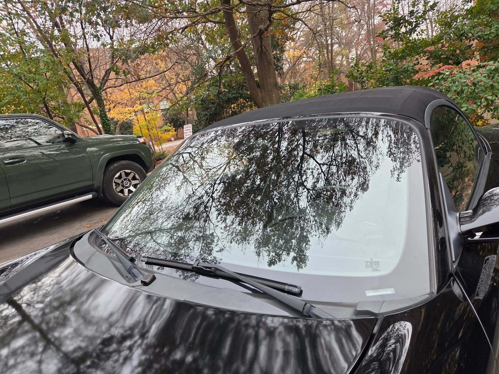 Brand-new windshield installed on a convertible, mirror finish